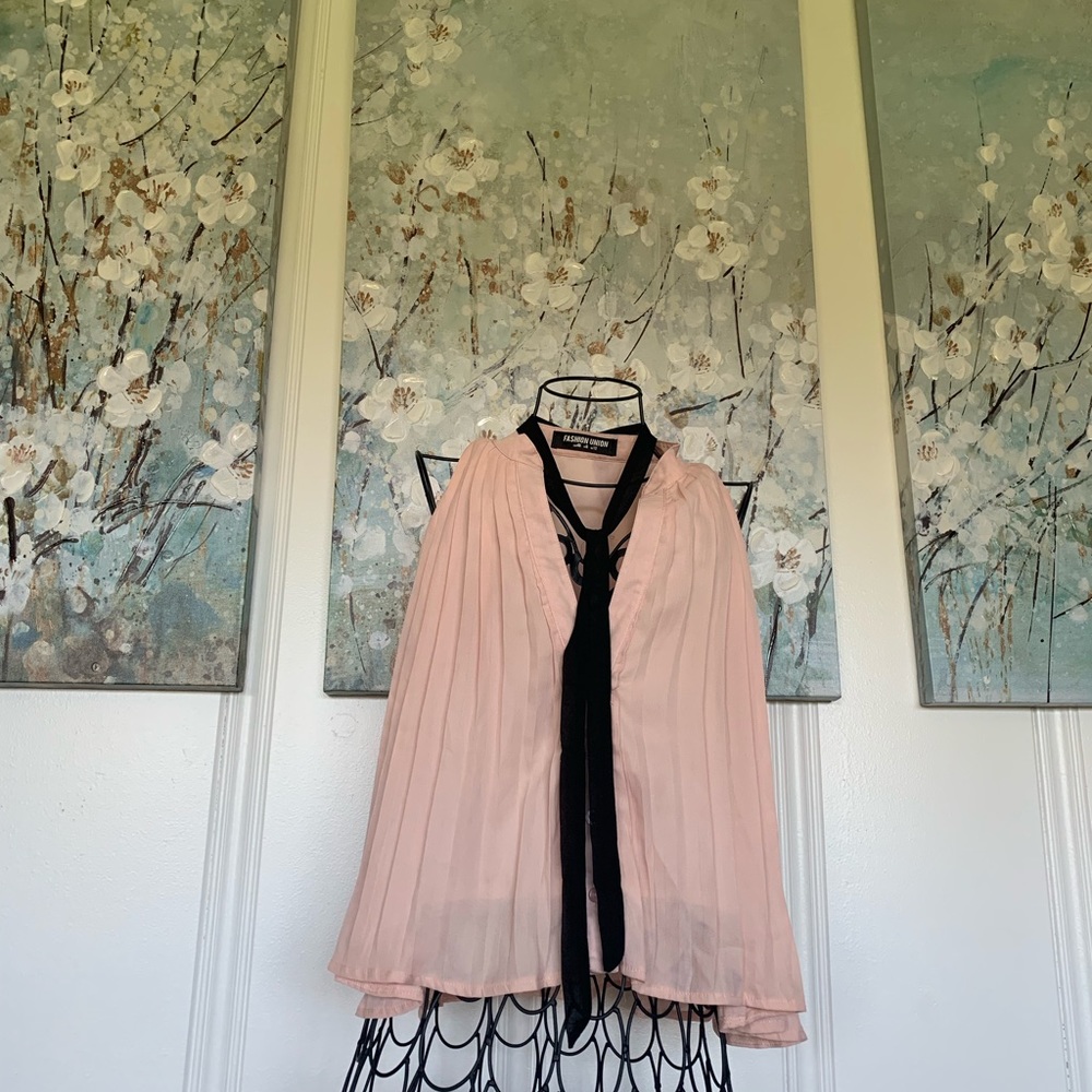Pink polyester tank top with black tie-up